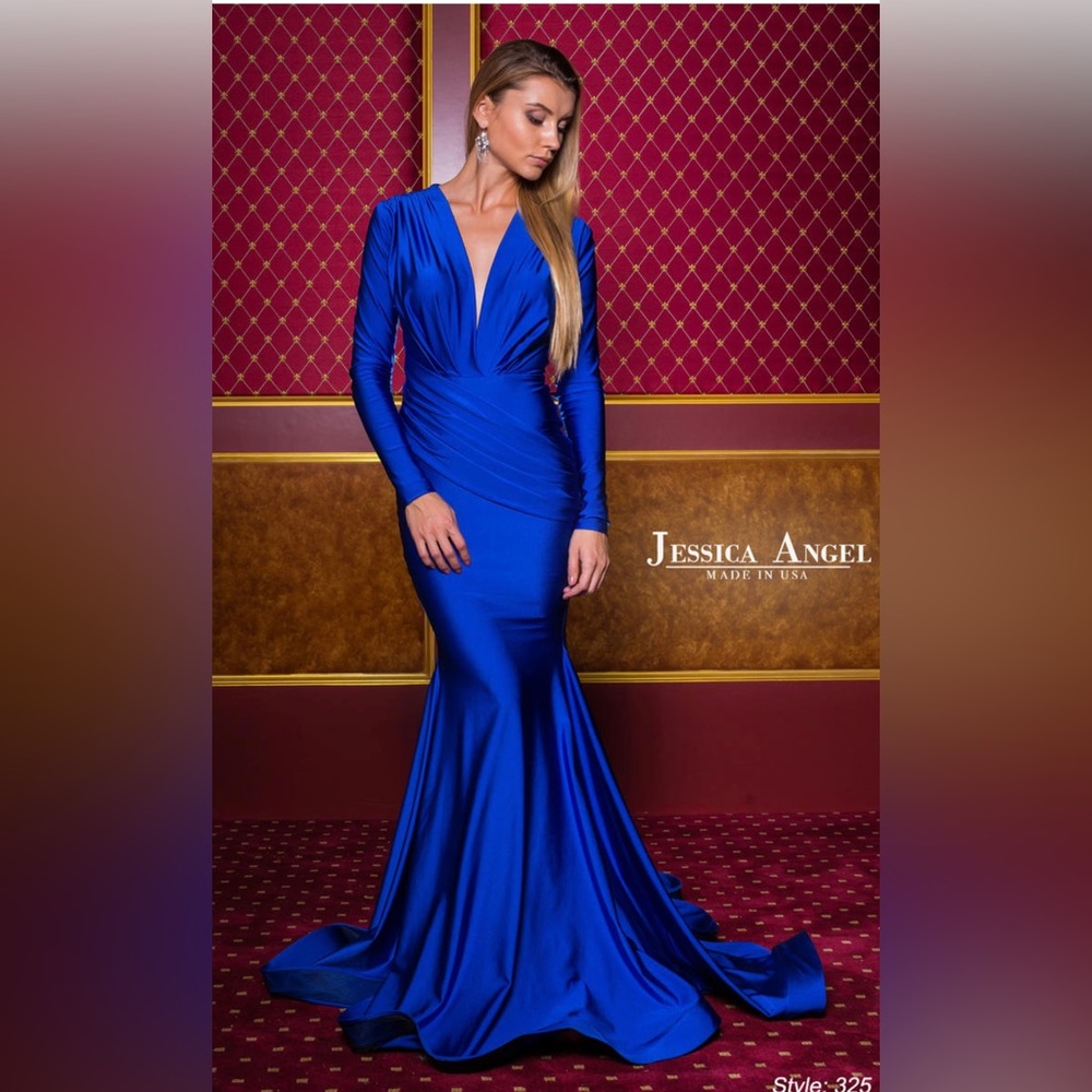 Royal blue, stretchy and spandex like material. Mermaid look with train!